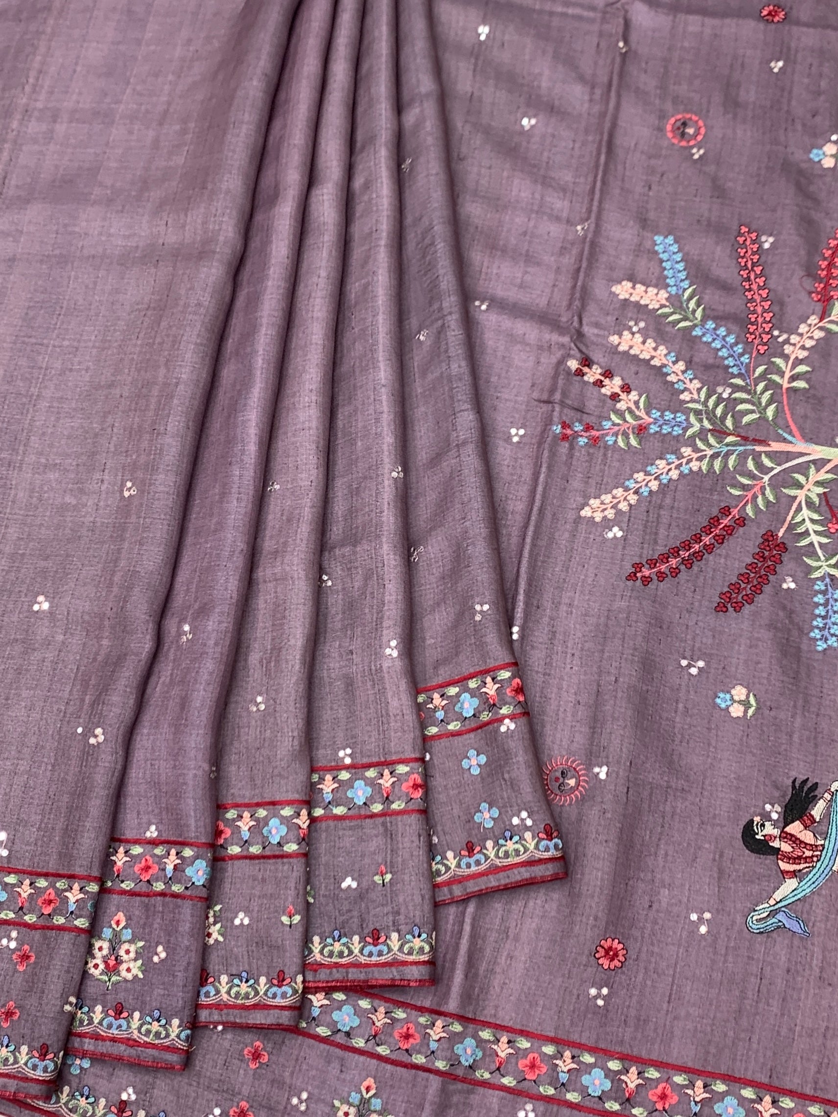 Enchanted Folklore: Narrative Hand-Embroidered Mauve Tussar Saree