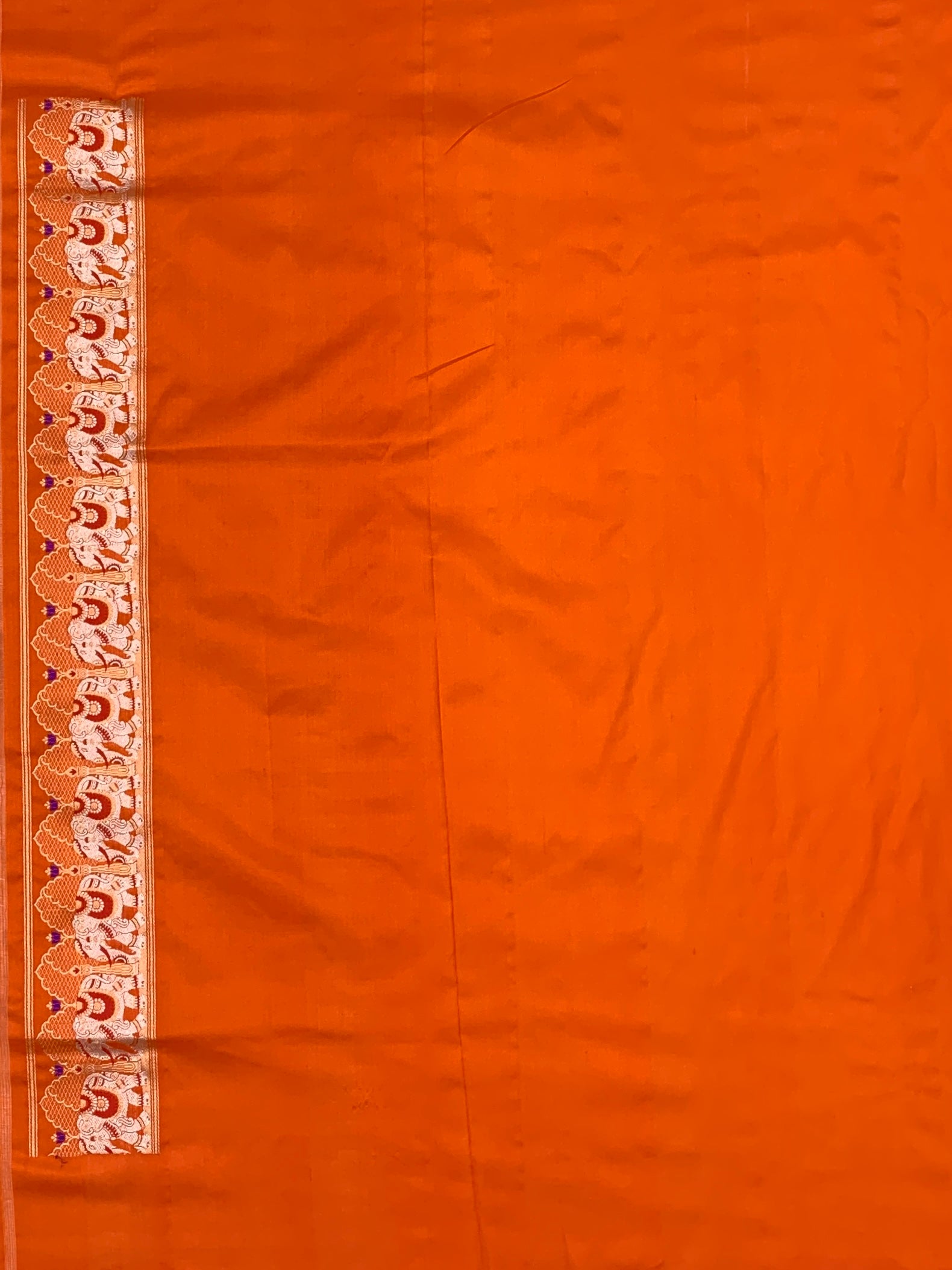 Exotic Tangerine Orange Banarasi Silk Saree with Elephant Motif Border
