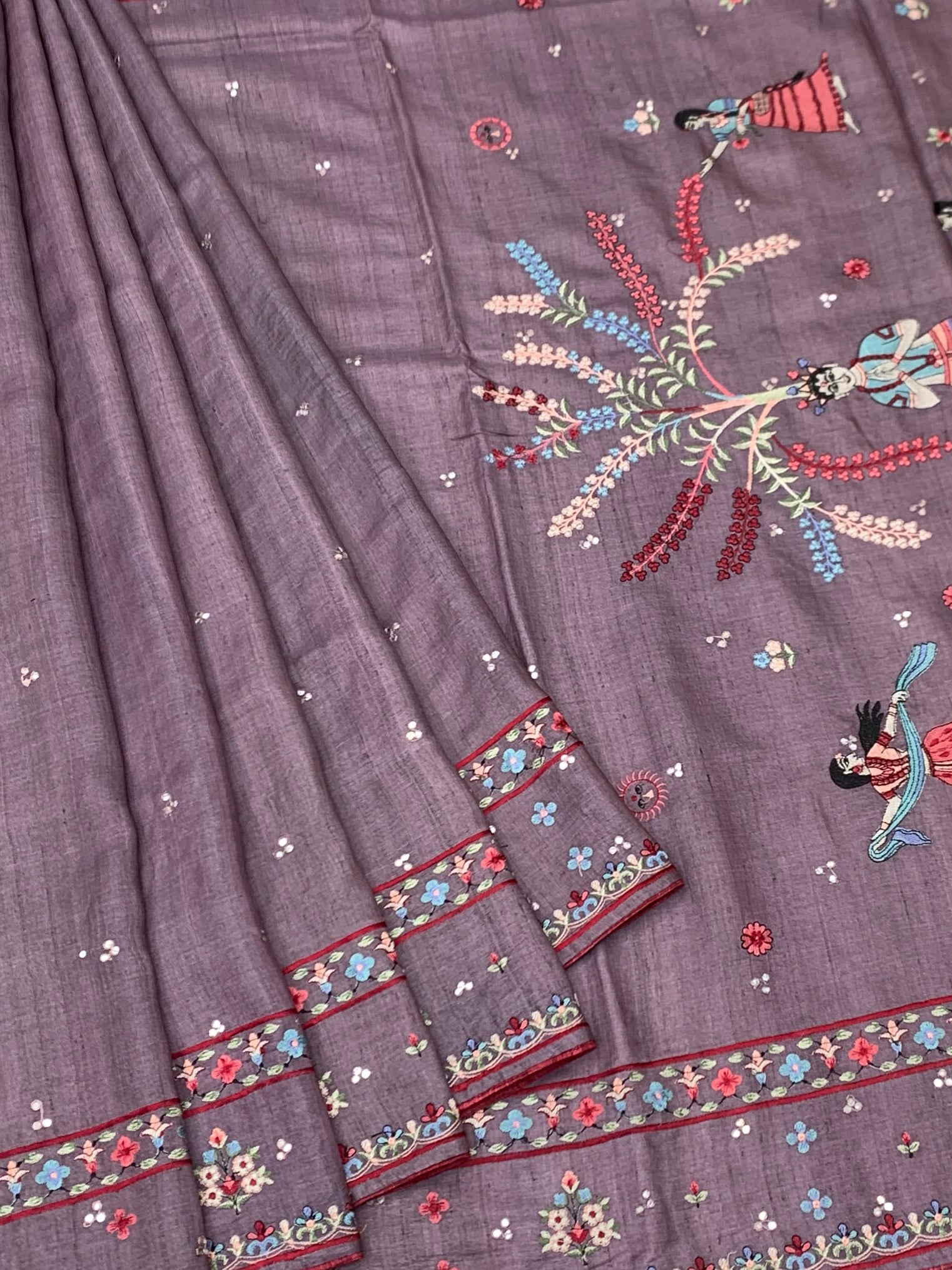 Enchanted Folklore: Narrative Hand-Embroidered Mauve Tussar Saree