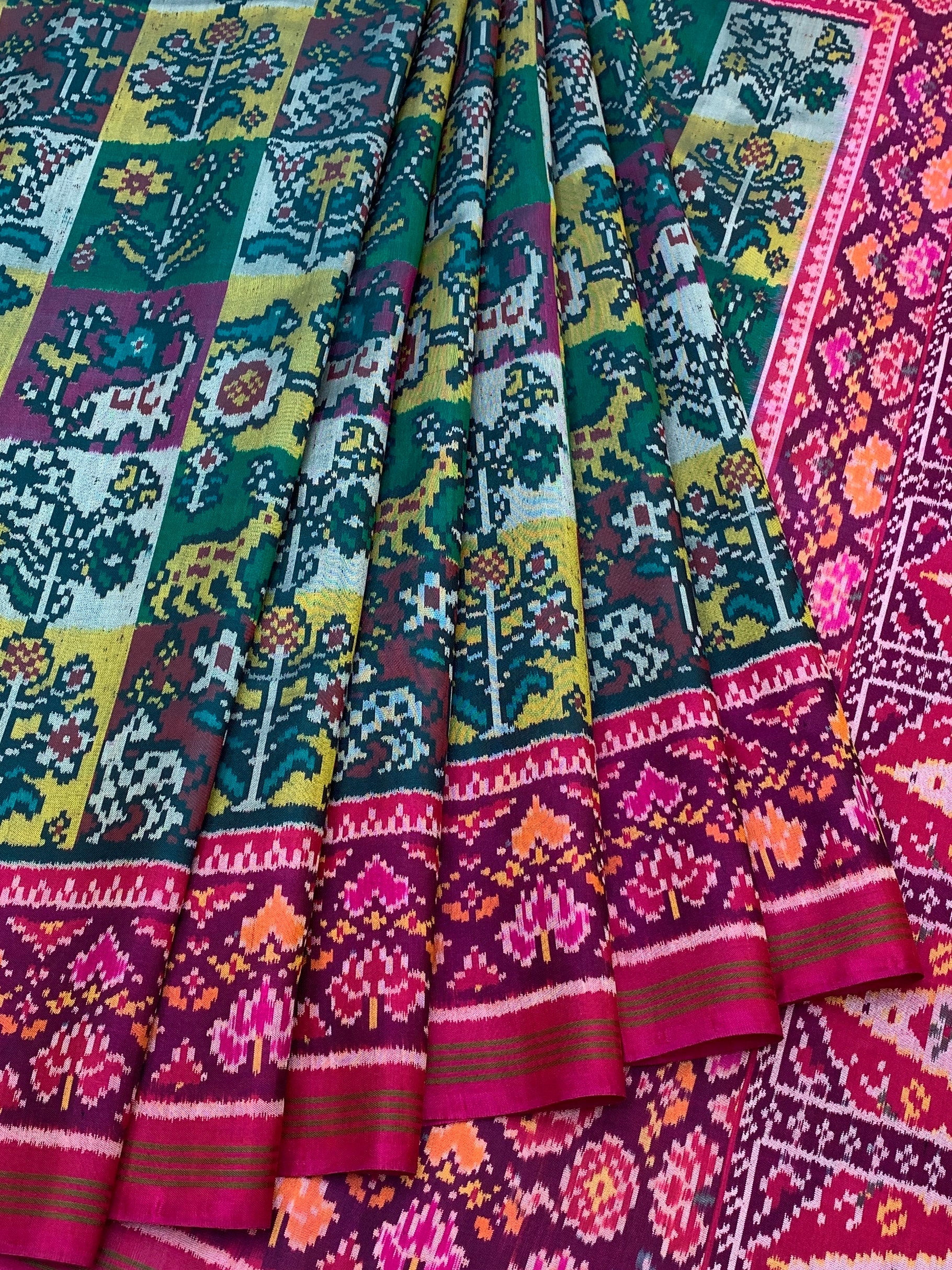 Majestic Tapestry: Multi-Paneled Patola Silk Saree with Woven Ikat Blouse