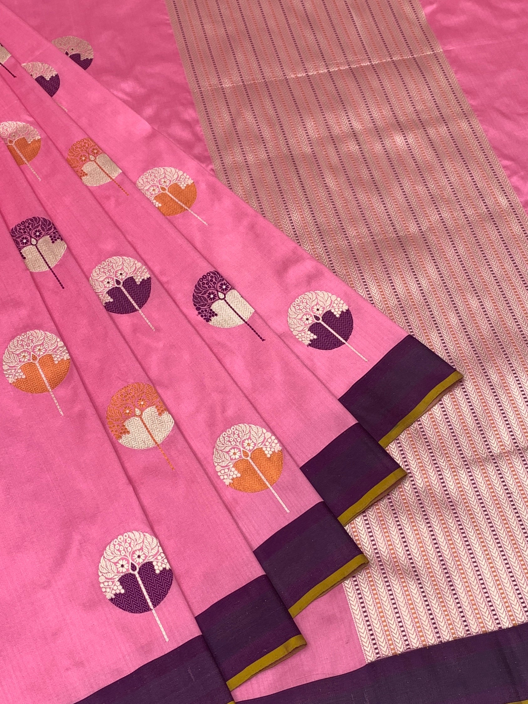Vibrant Pink Banarasi Silk Saree with Stylized Botanical Motifs