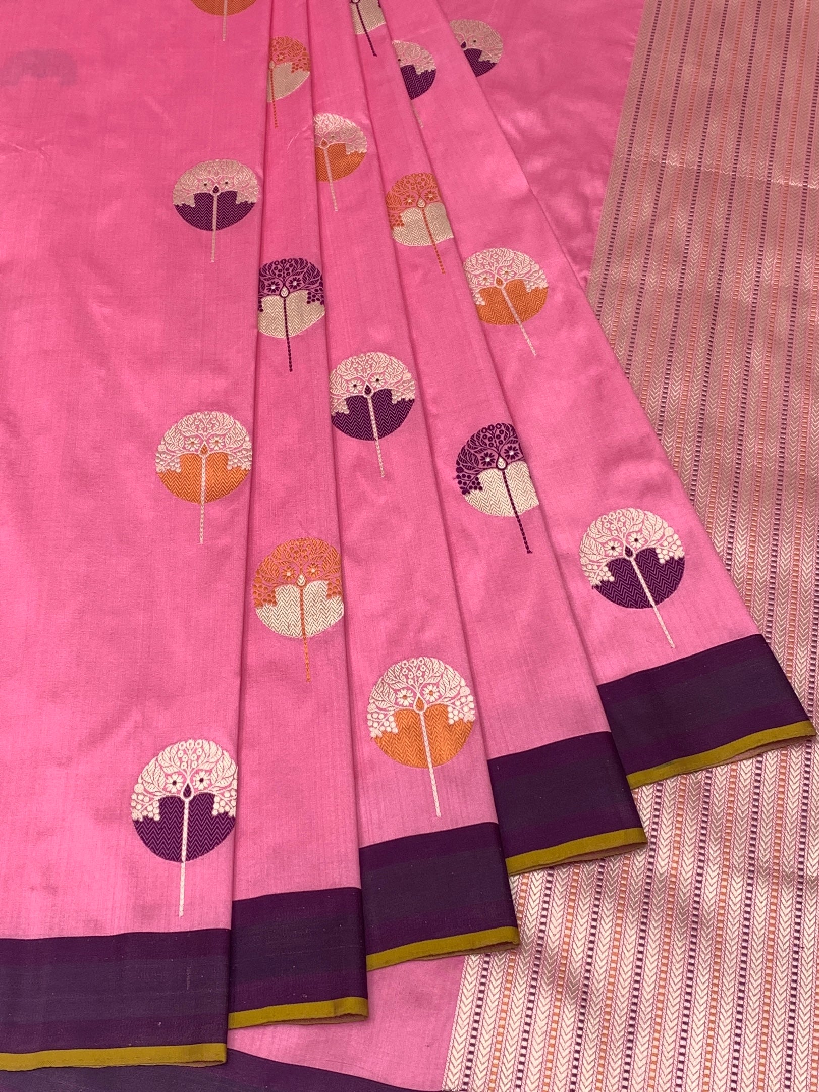 Vibrant Pink Banarasi Silk Saree with Stylized Botanical Motifs