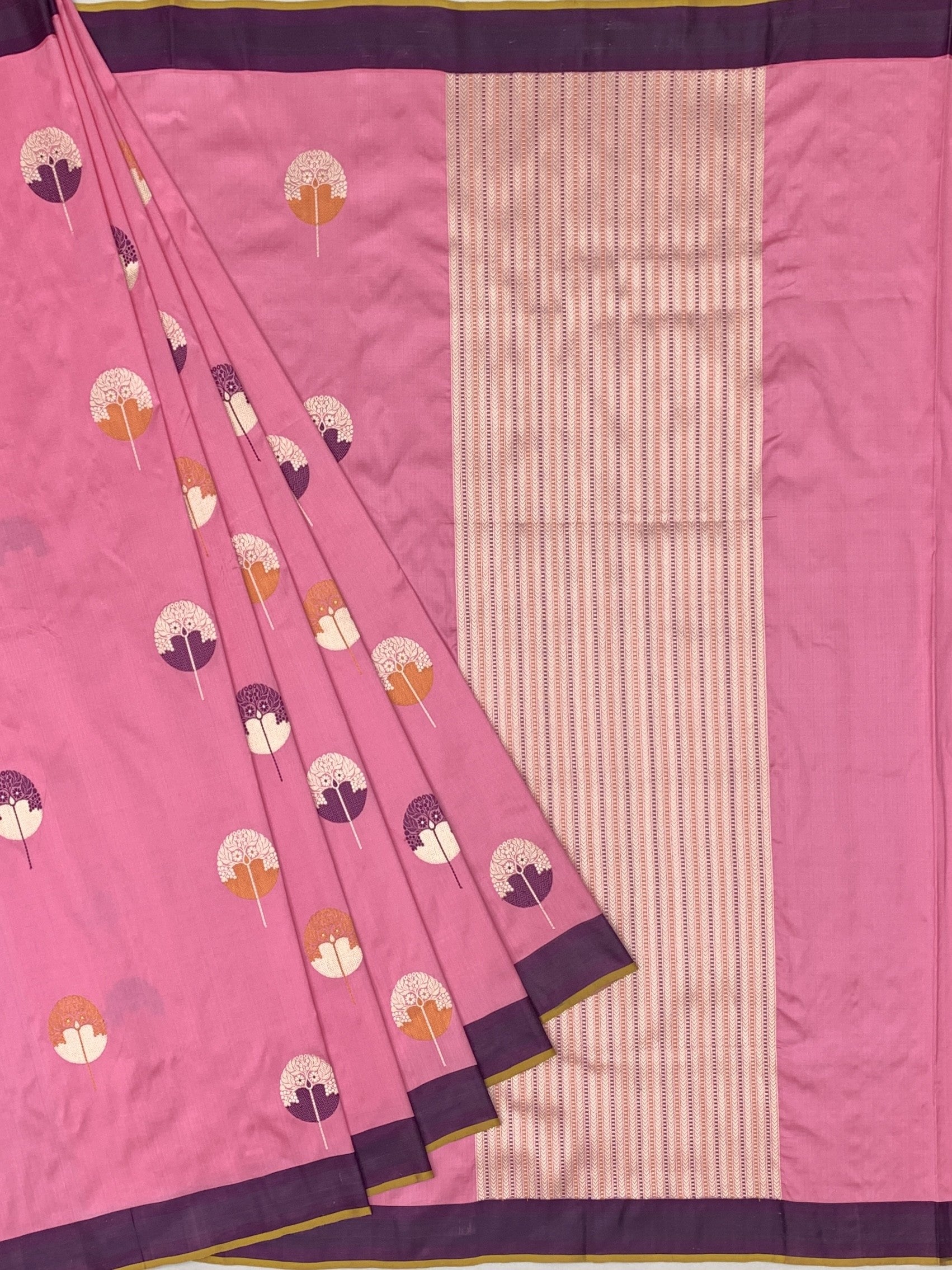 Vibrant Pink Banarasi Silk Saree with Stylized Botanical Motifs