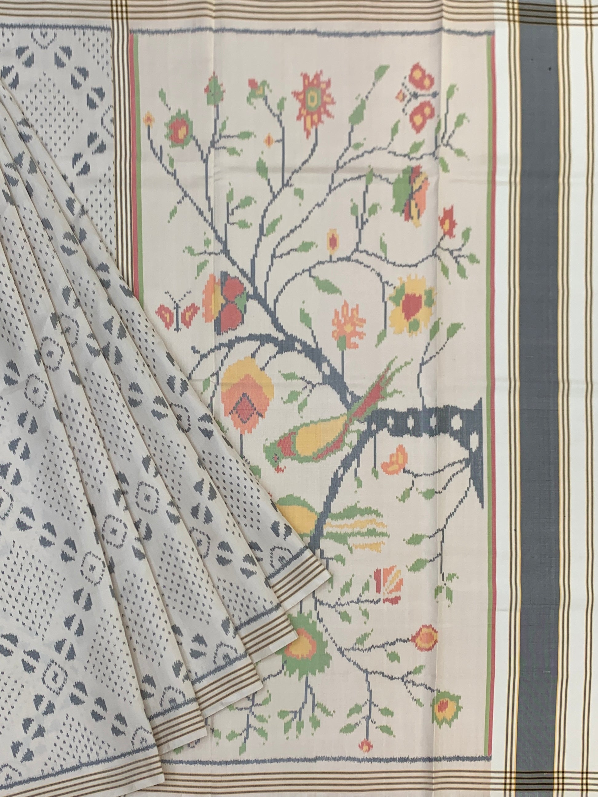 Pristine Ivory Patola Saree with Scenic 'Tree of Life' Pallu