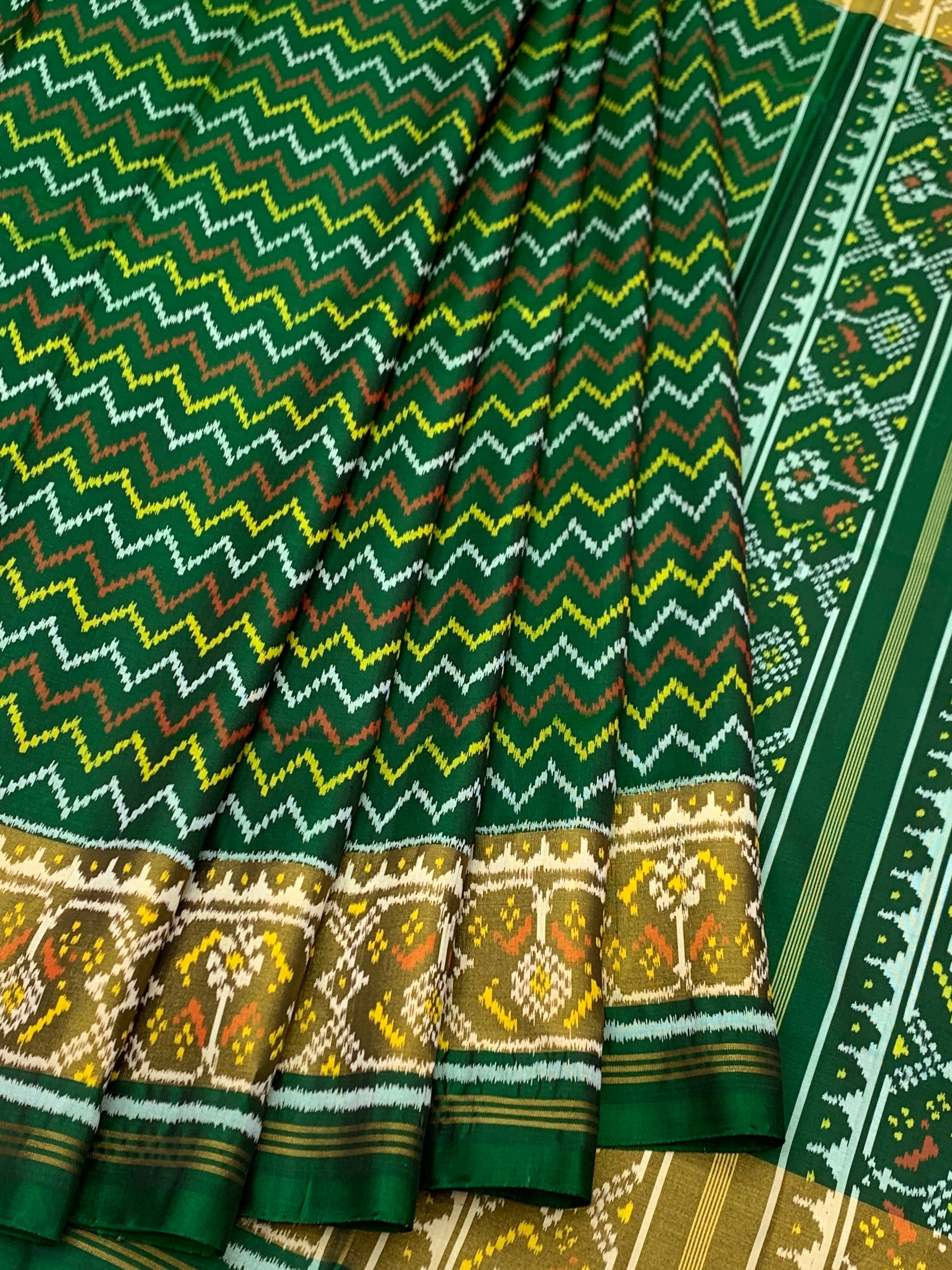 Emerald Green Chevron Waves: Heritage Rajkot Patola Silk Saree