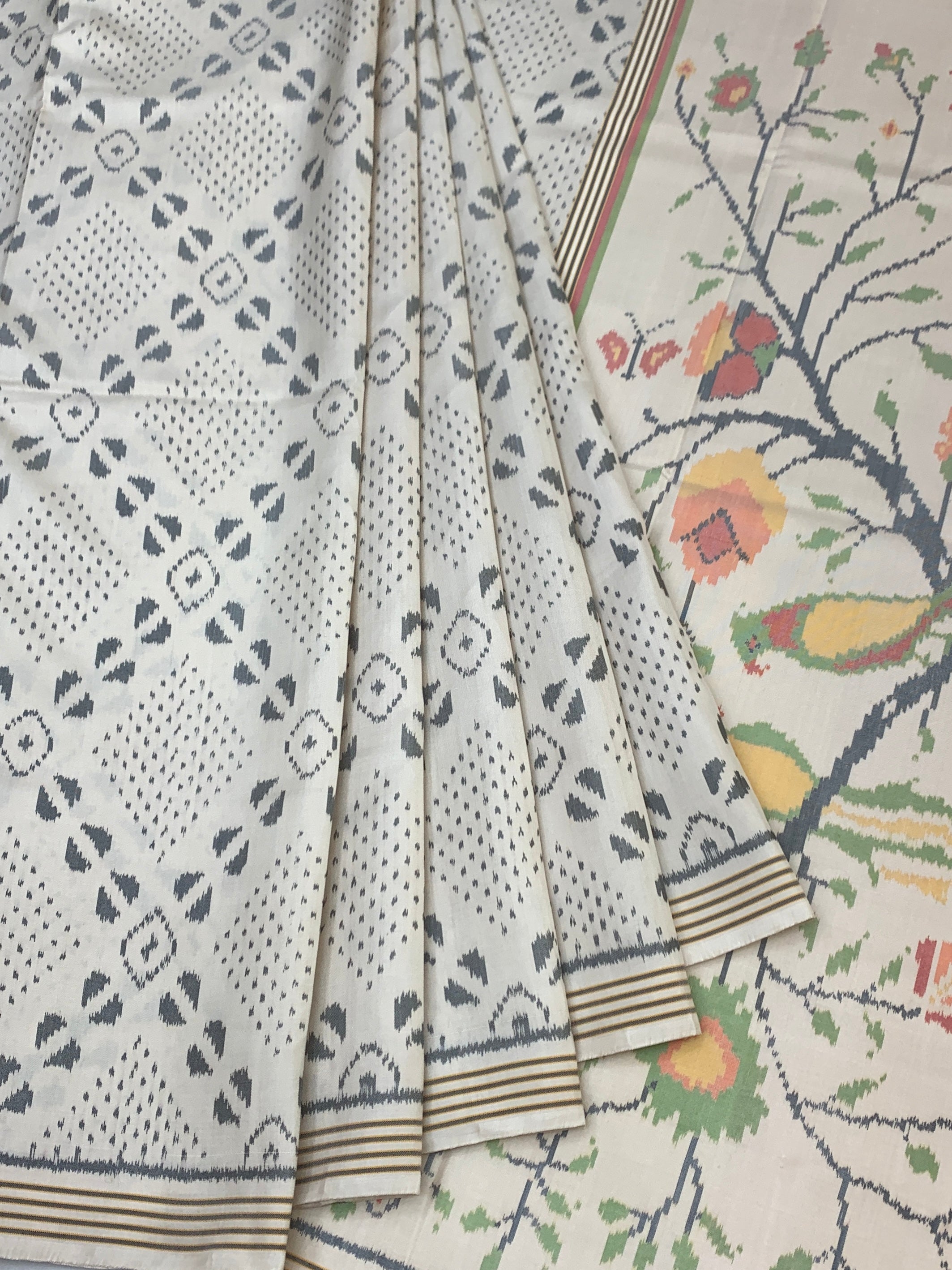 Pristine Ivory Patola Saree with Scenic 'Tree of Life' Pallu