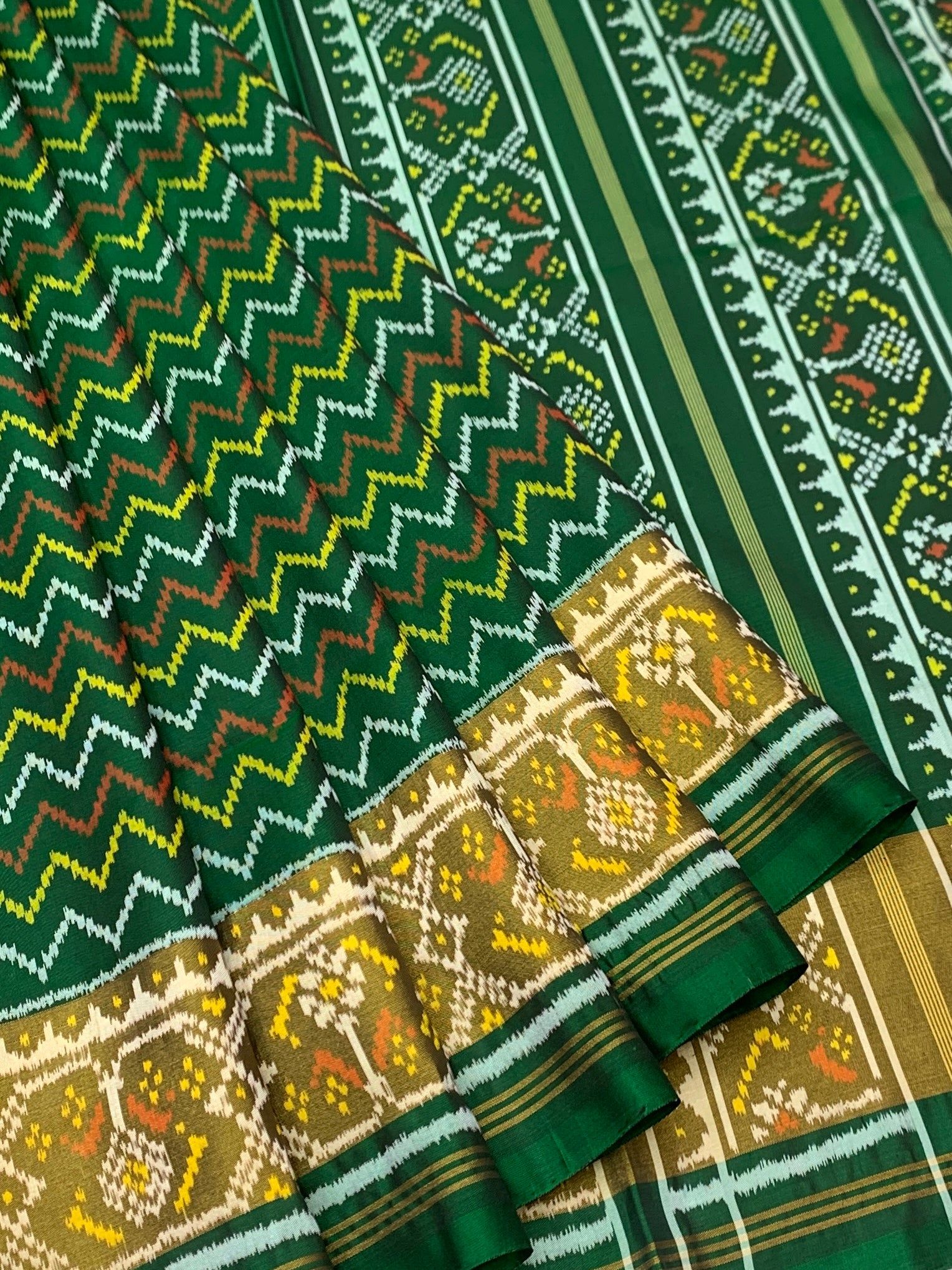 Emerald Green Chevron Waves: Heritage Rajkot Patola Silk Saree