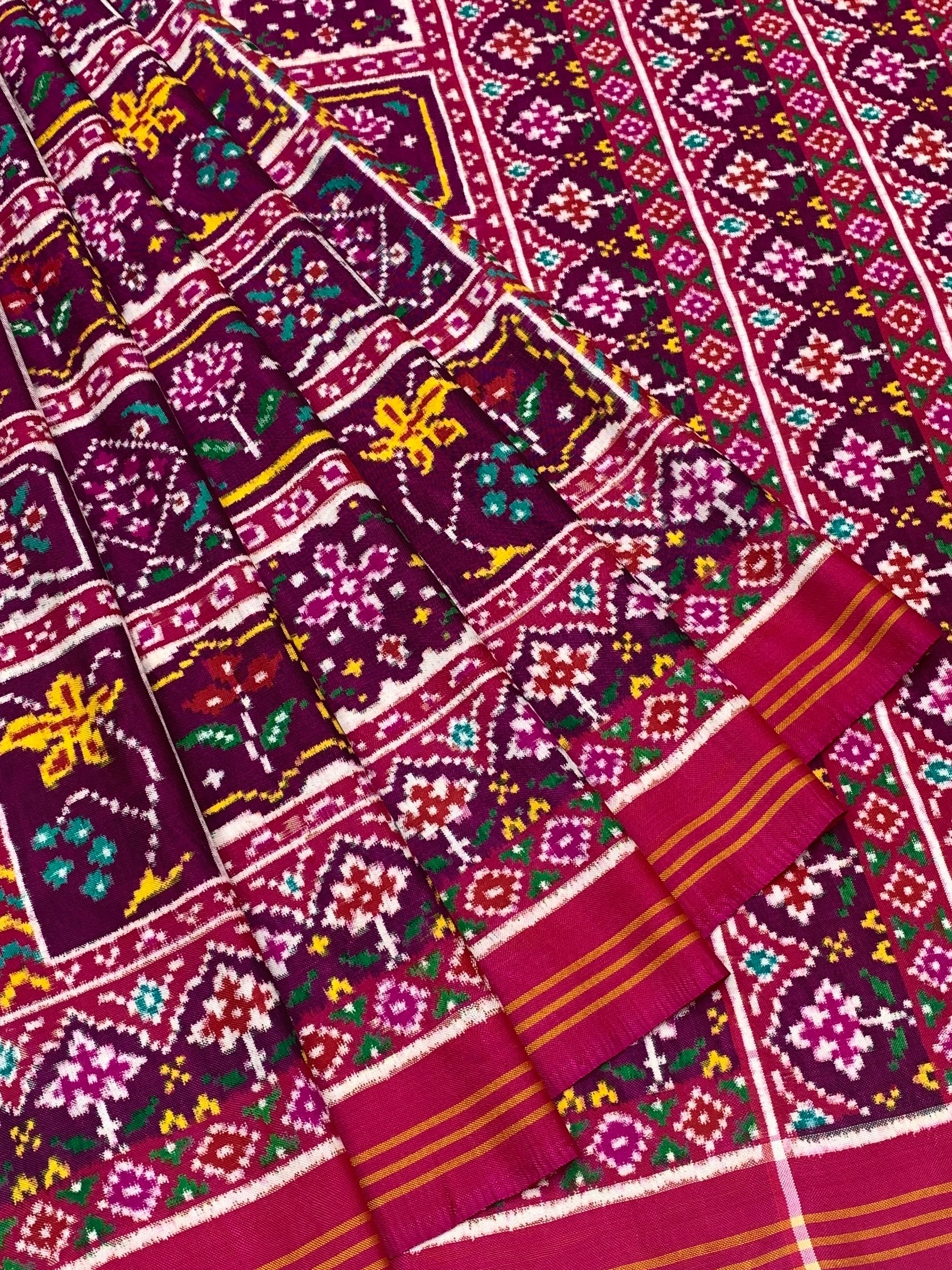 Product Title: Regal Plum & Rani Pink Double Ikat Patan Patola Silk Saree