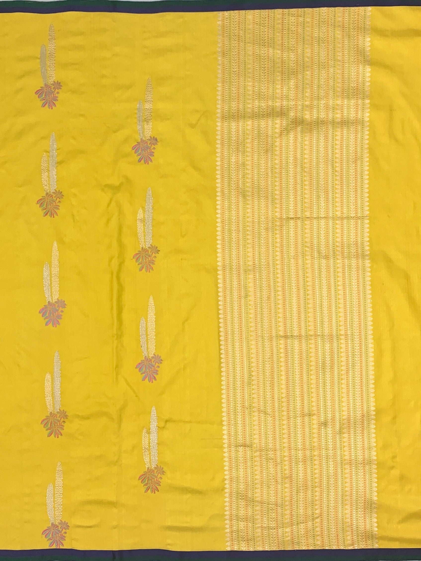 Radiant Yellow Banarasi Silk Saree with Woven Floral Motifs