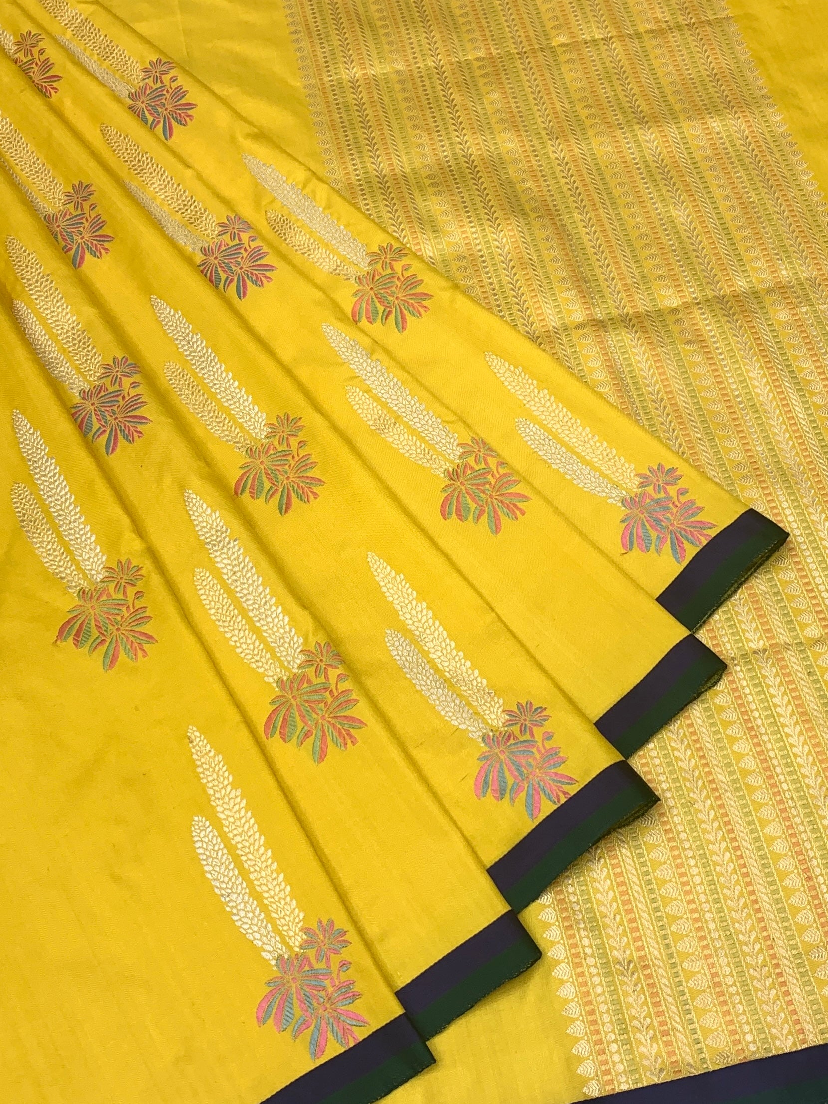 Radiant Yellow Banarasi Silk Saree with Woven Floral Motifs