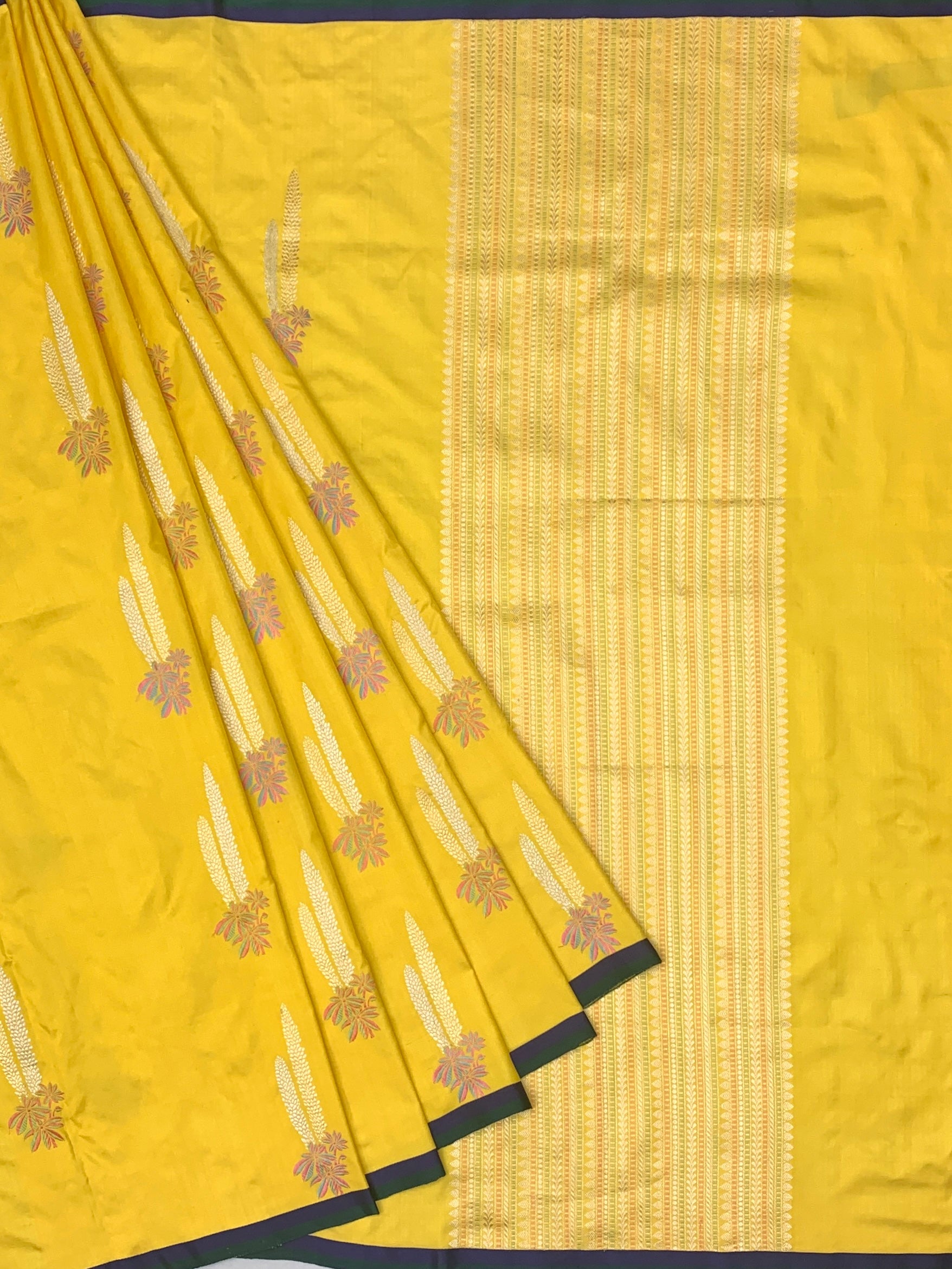 Radiant Yellow Banarasi Silk Saree with Woven Floral Motifs
