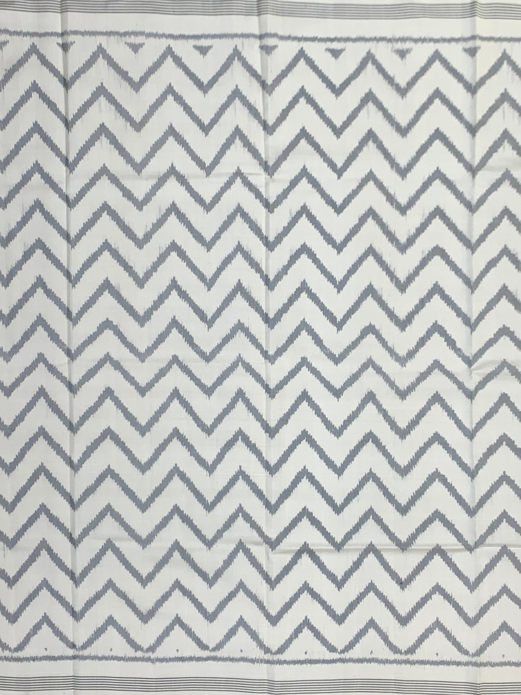 Ivory Chevron Ikat Patola Saree with Scenic Popat Pallu