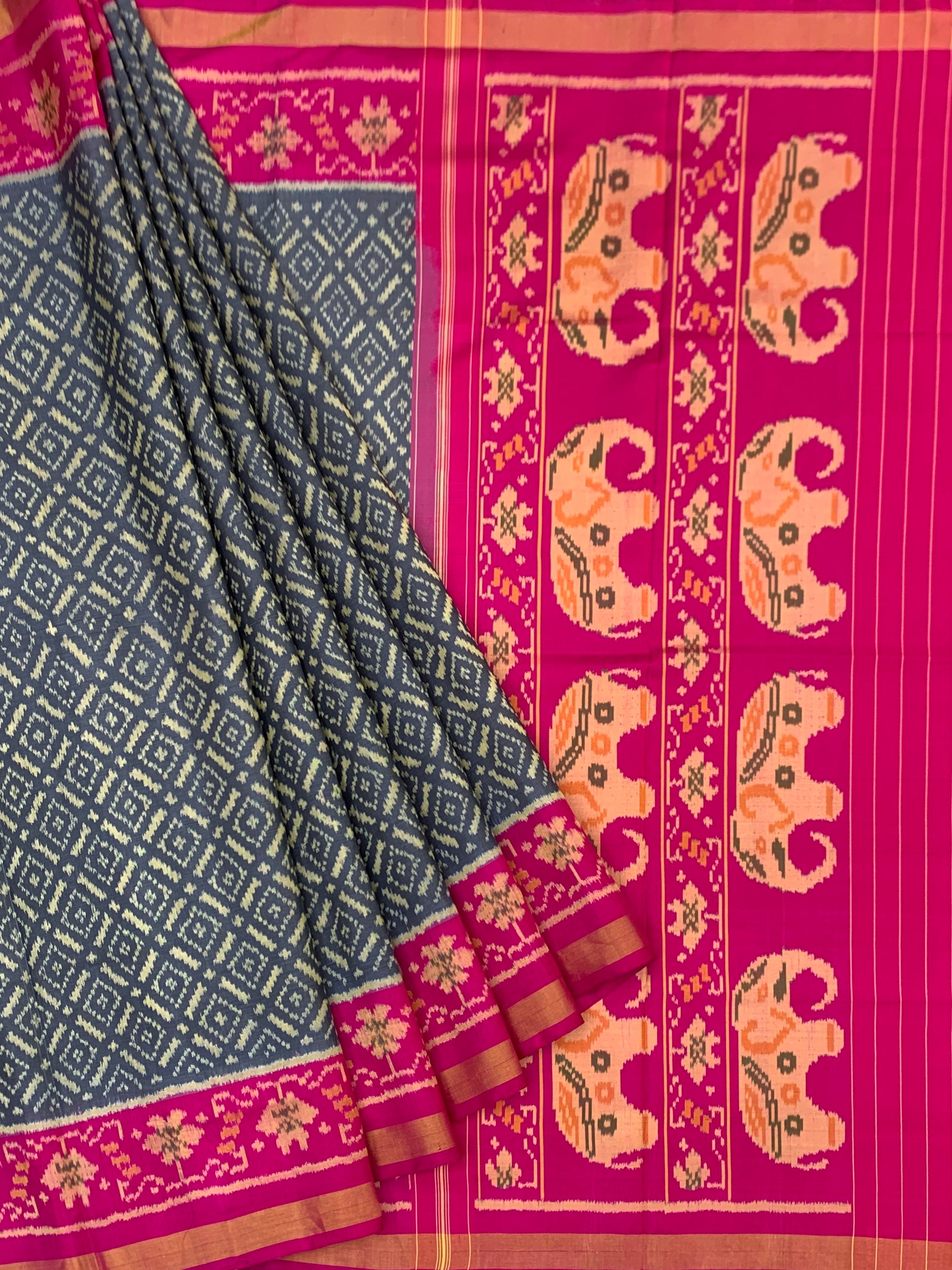 Regal Harmony: Charcoal & Magenta Elephant Motif Rajkot Patola Silk Saree