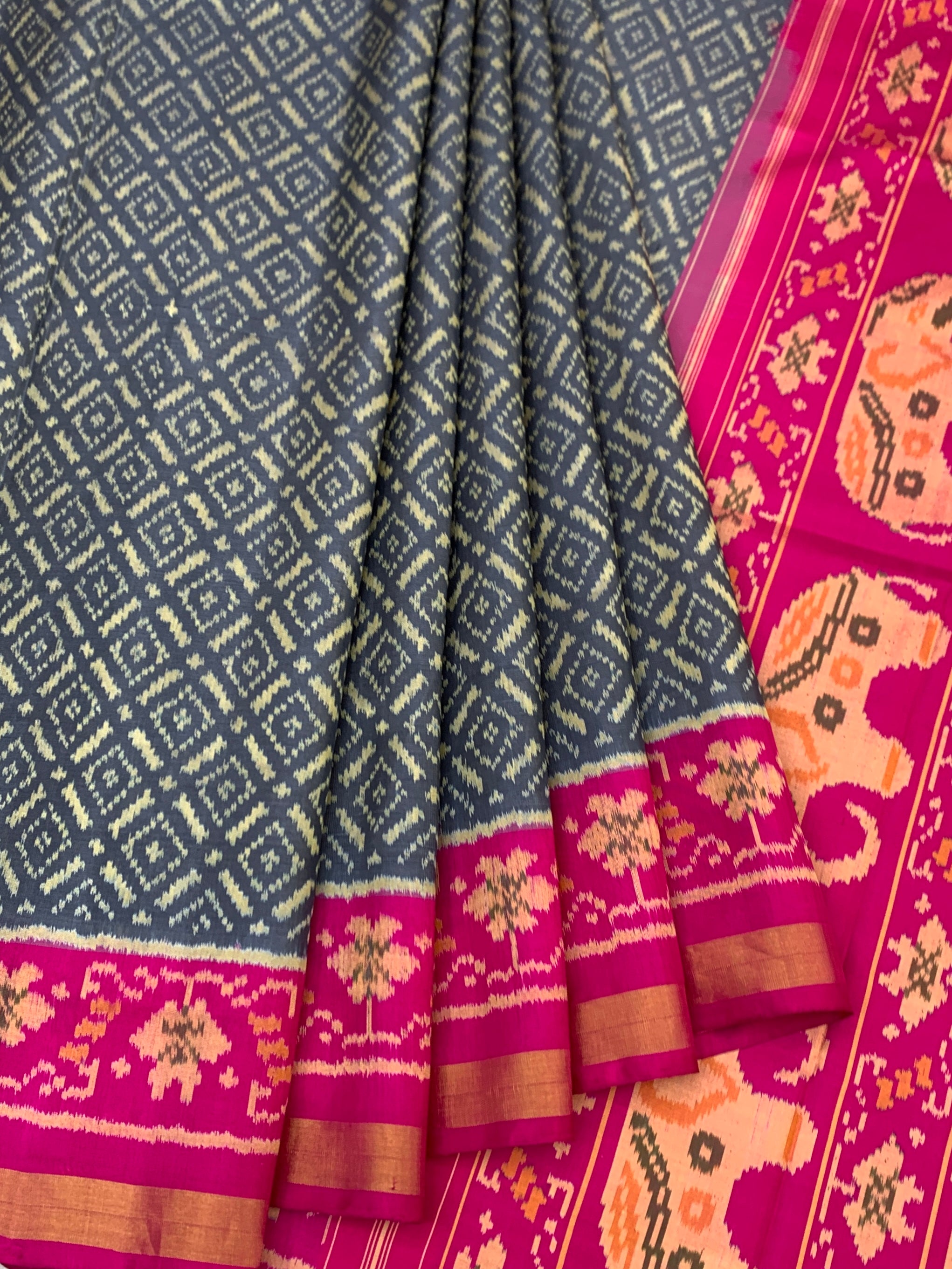 Regal Harmony: Charcoal & Magenta Elephant Motif Rajkot Patola Silk Saree