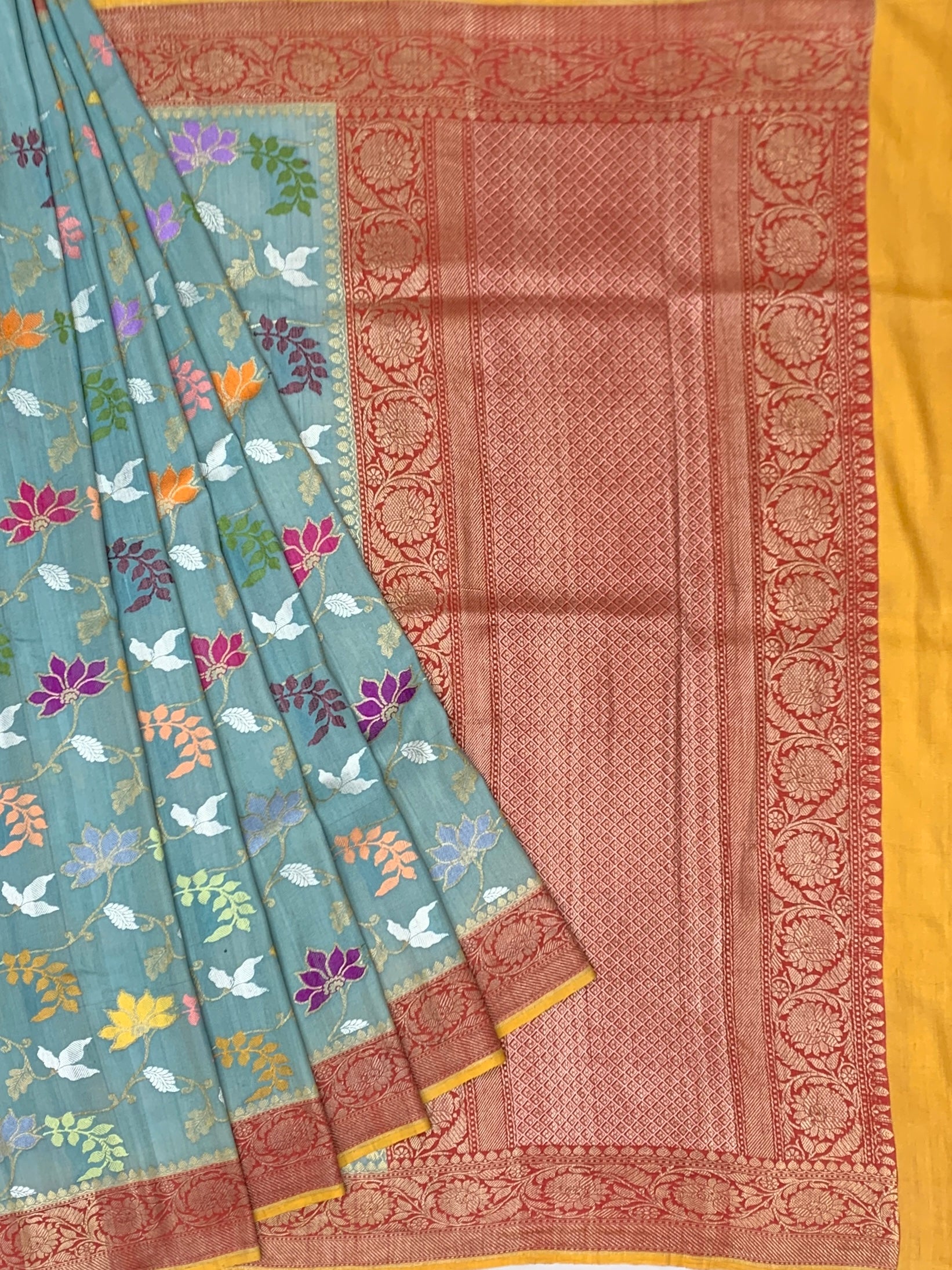 Dusty Blue Tussore Georgette Saree with Meenakari Botanicals and Rust Zari Pallu