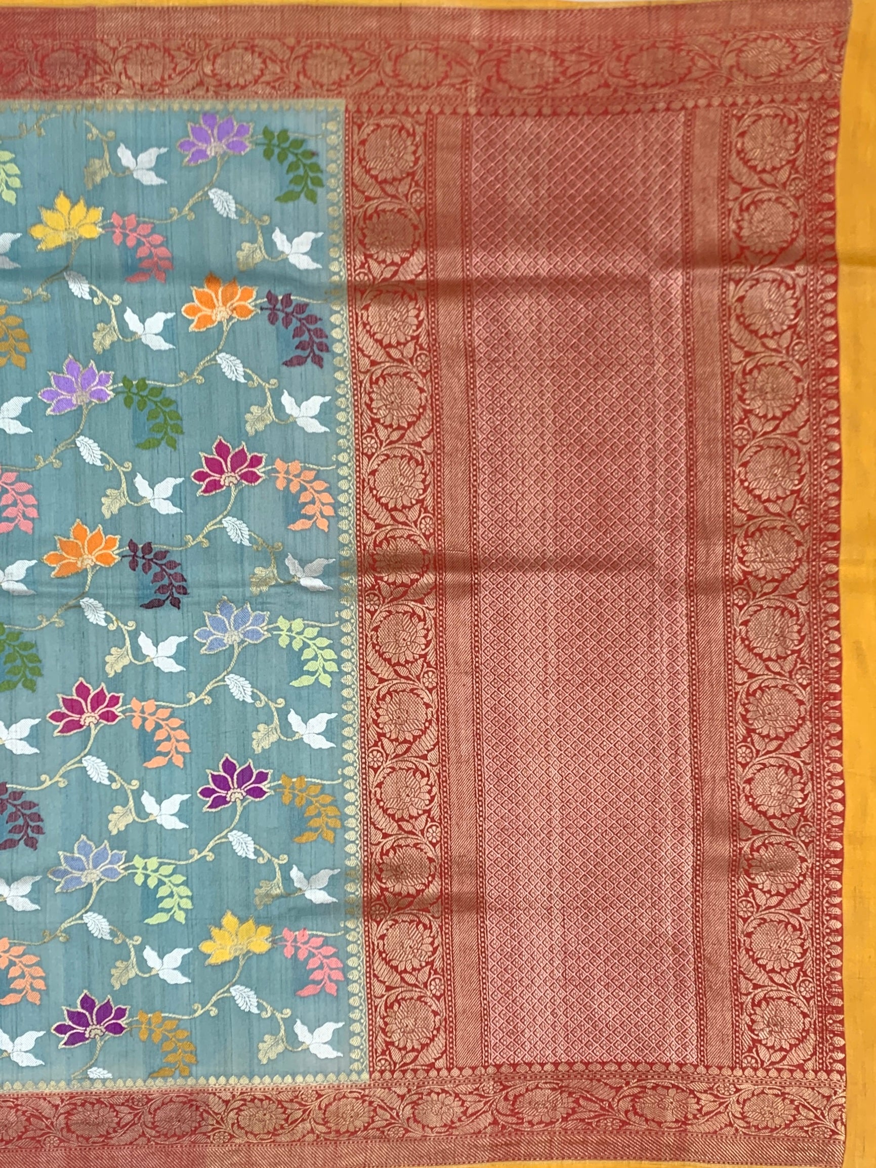 Dusty Blue Tussore Georgette Saree with Meenakari Botanicals and Rust Zari Pallu