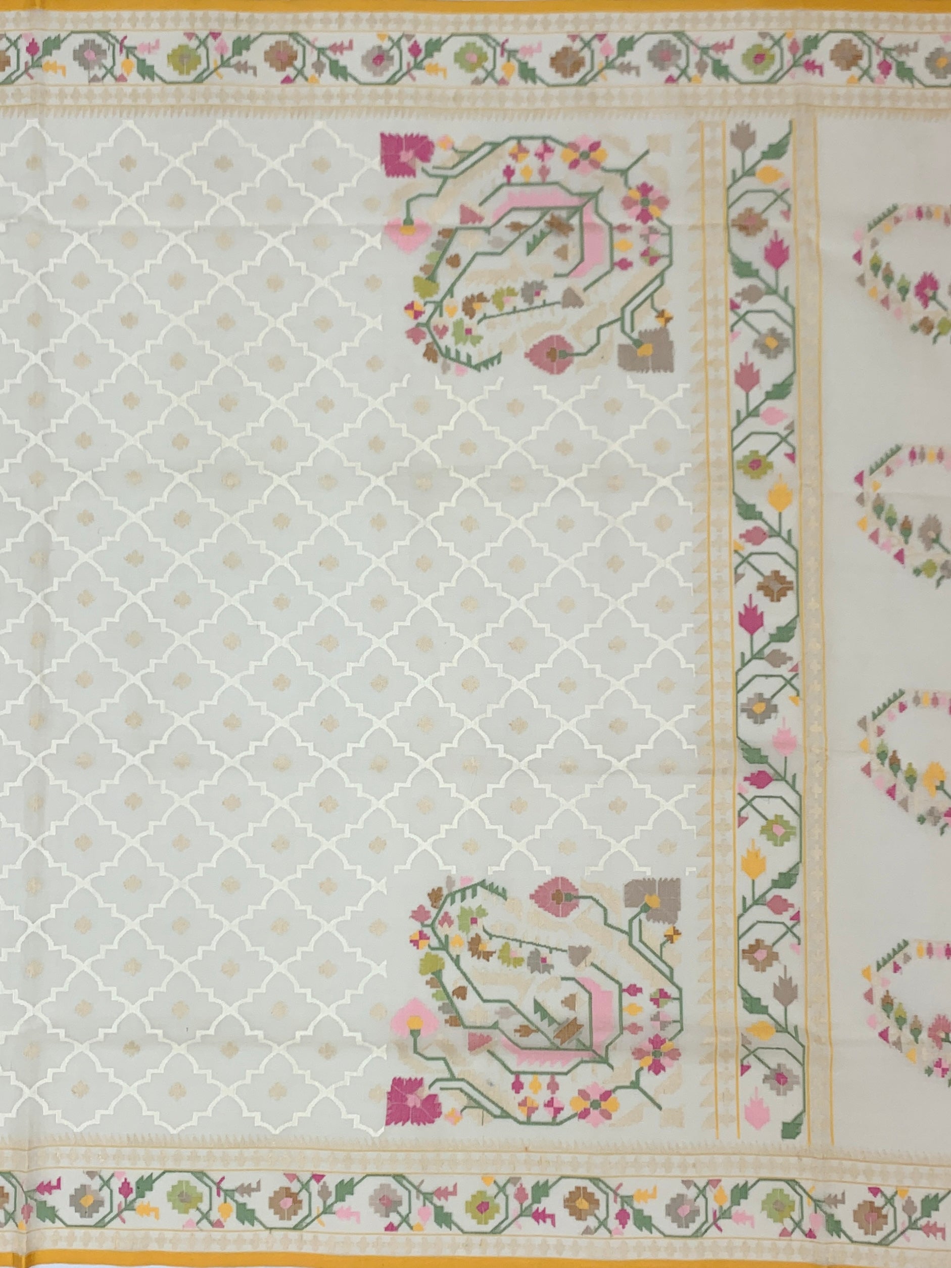 Ethereal Cream Cotton Jamdani Saree with Geometric Lattice and Stylized Paisleys
