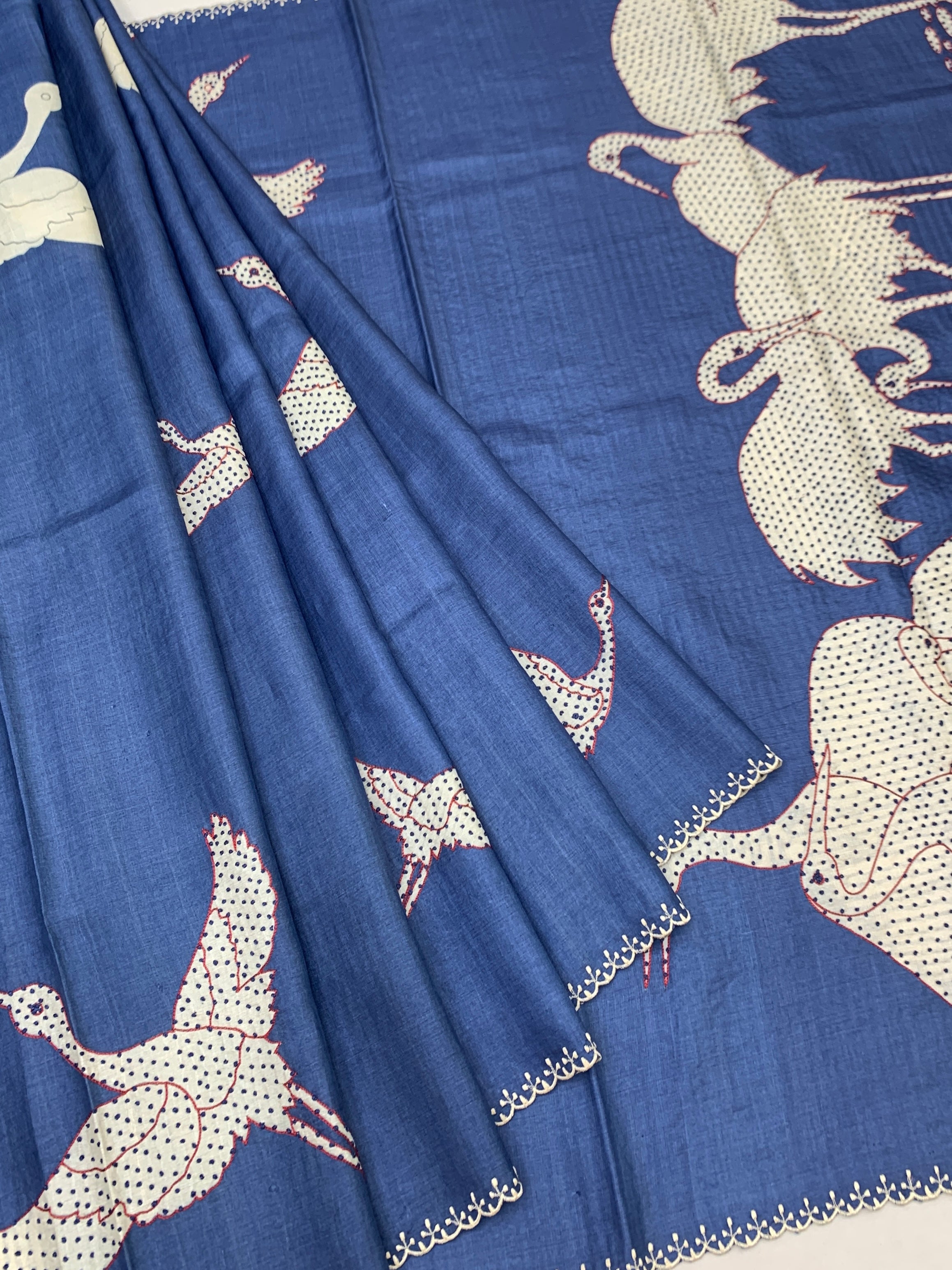Indigo Serenade: Crane Motif Hand-Embroidered Tussar Silk Saree