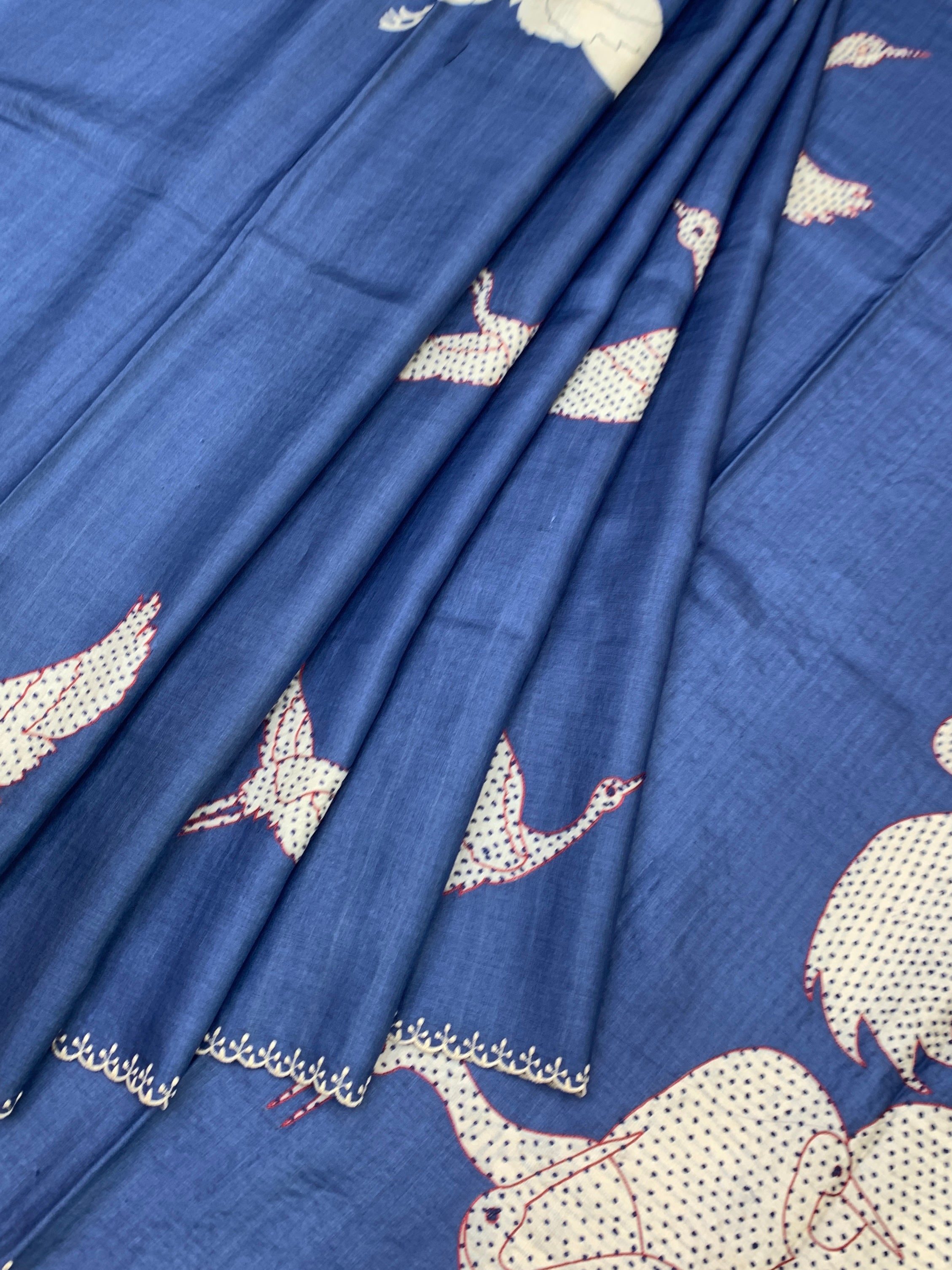 Indigo Serenade: Crane Motif Hand-Embroidered Tussar Silk Saree
