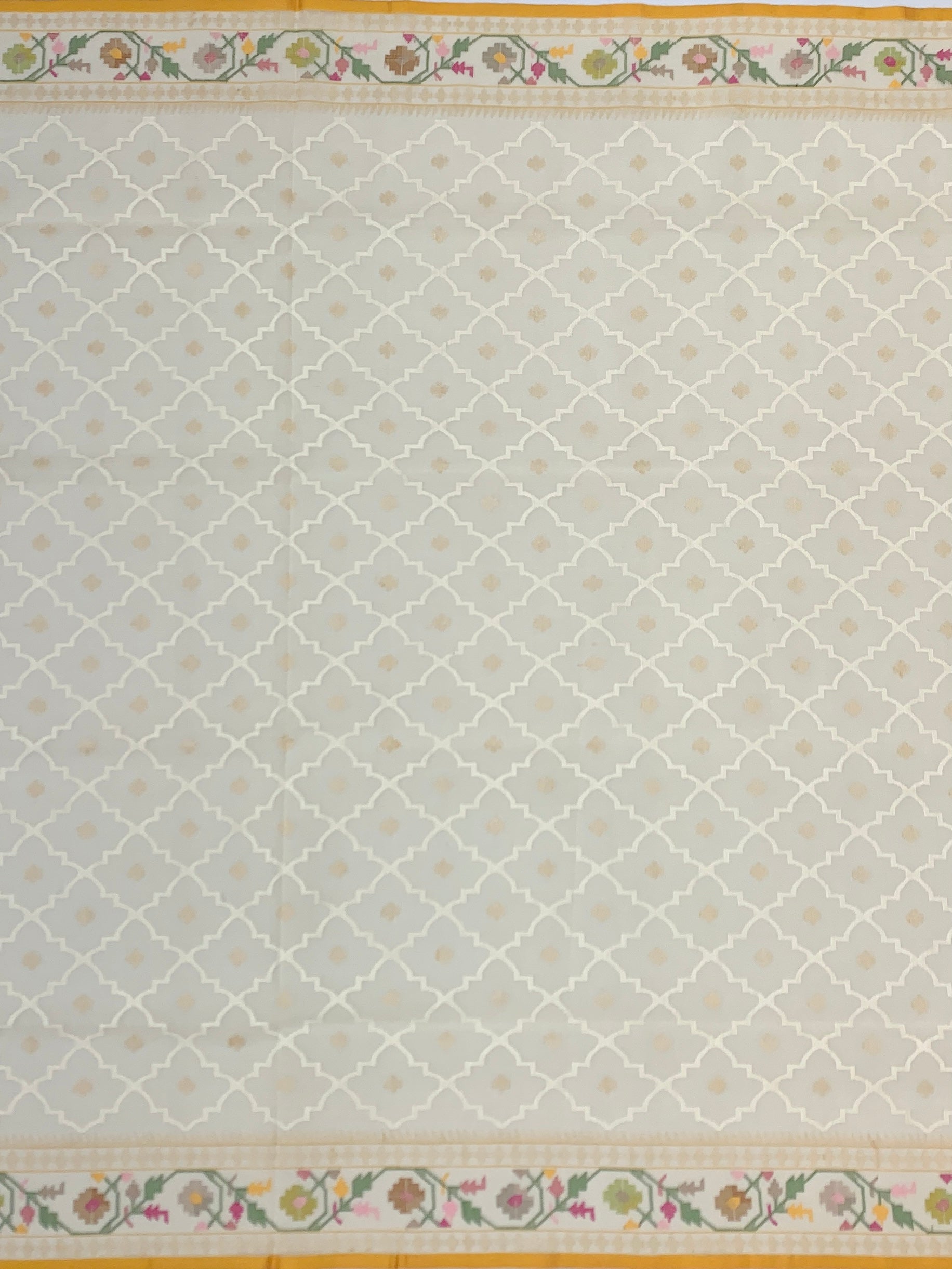Ethereal Cream Cotton Jamdani Saree with Geometric Lattice and Stylized Paisleys