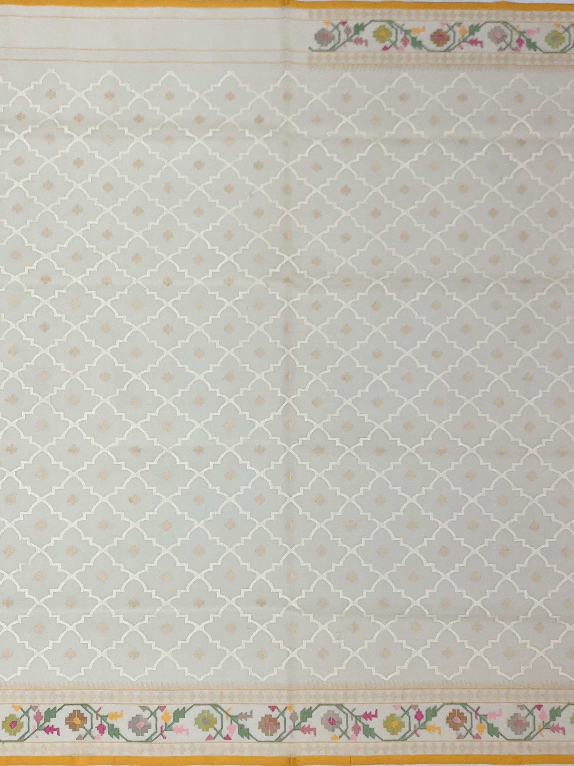 Ethereal Cream Cotton Jamdani Saree with Geometric Lattice and Stylized Paisleys