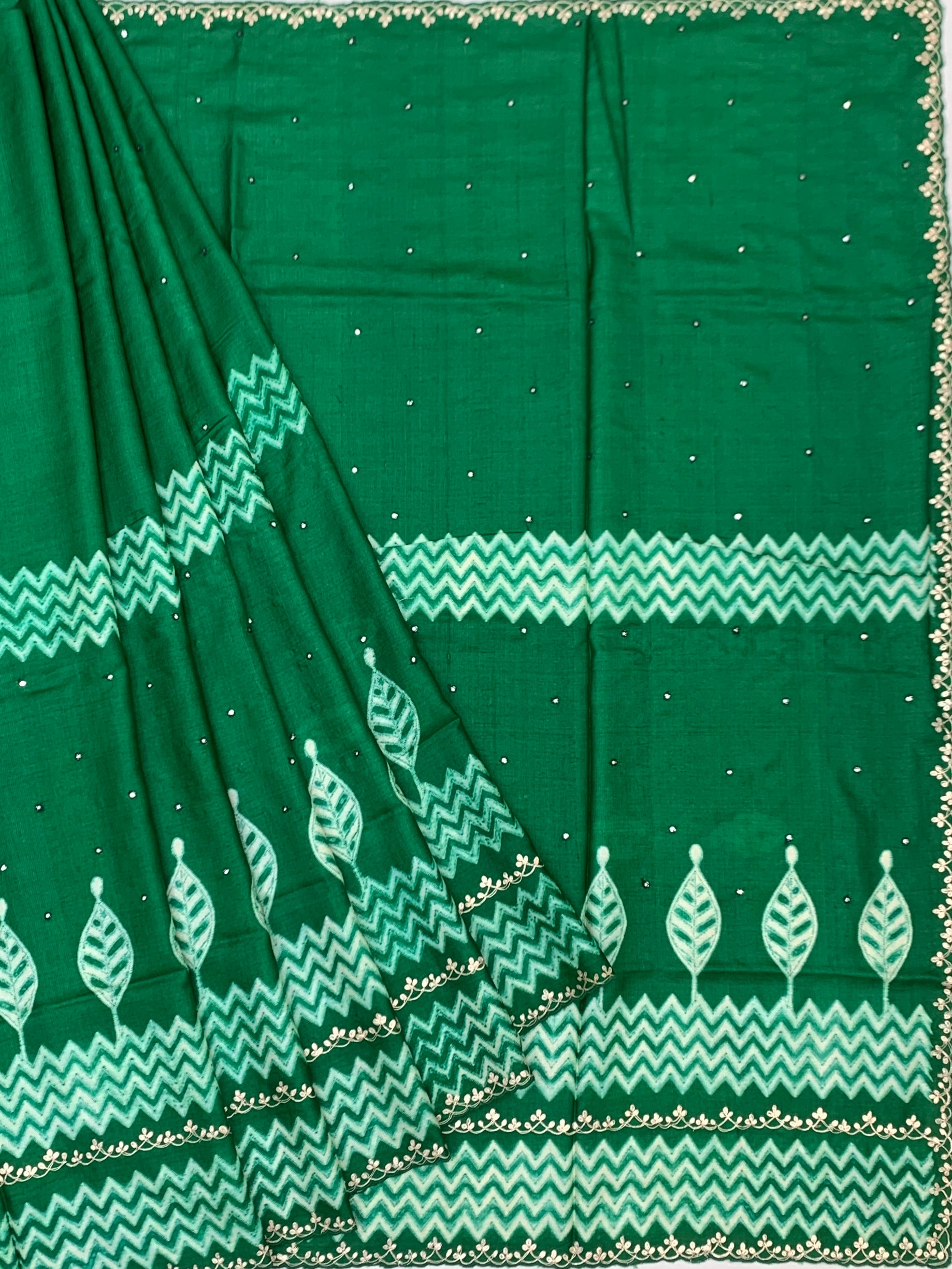 Emerald Green Tussore Silk Saree with Chevron Patterns & Embroidered Borders