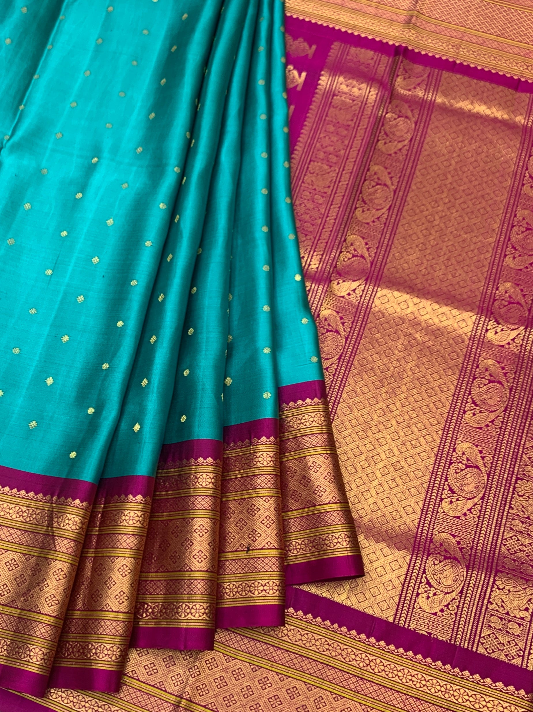 Exquisite Peacock Blue & Magenta Gadwal Twill Pattu Saree