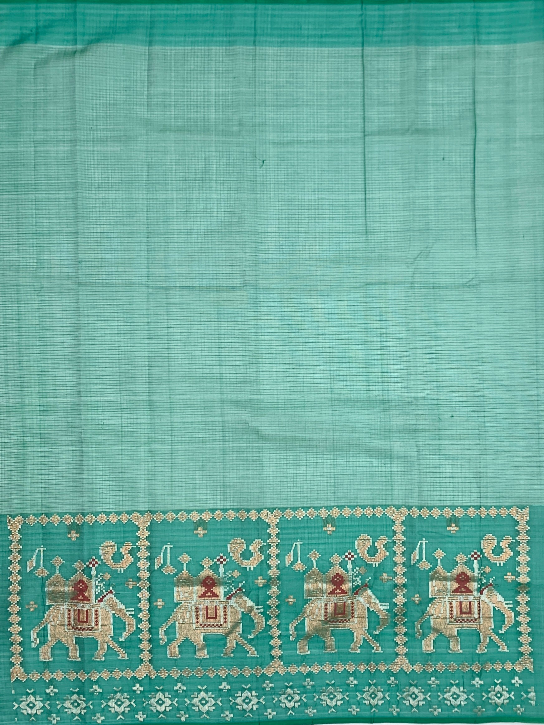 Sea Green Zari Kota Saree with Majestic Elephant Border