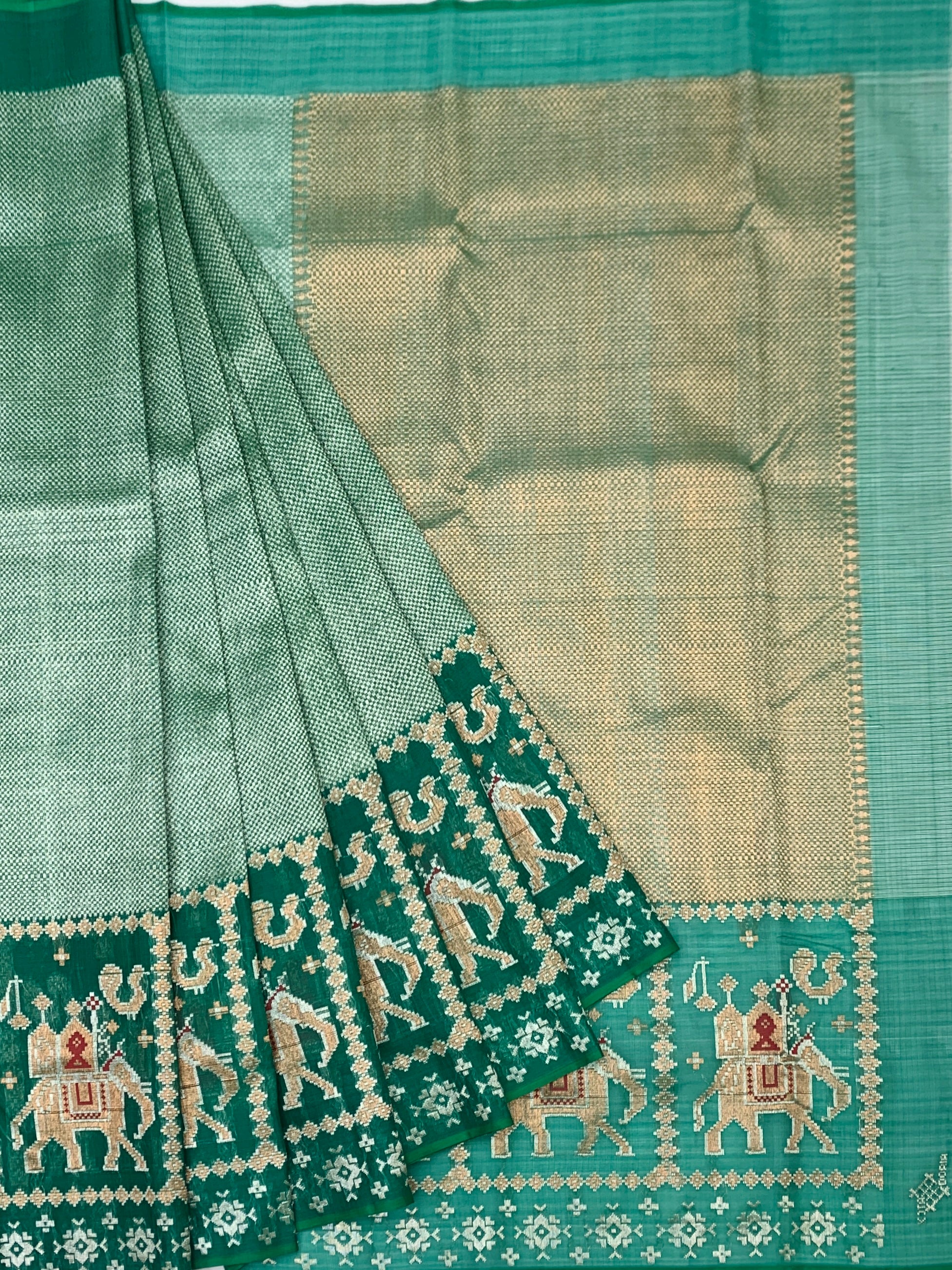 Sea Green Zari Kota Saree with Majestic Elephant Border