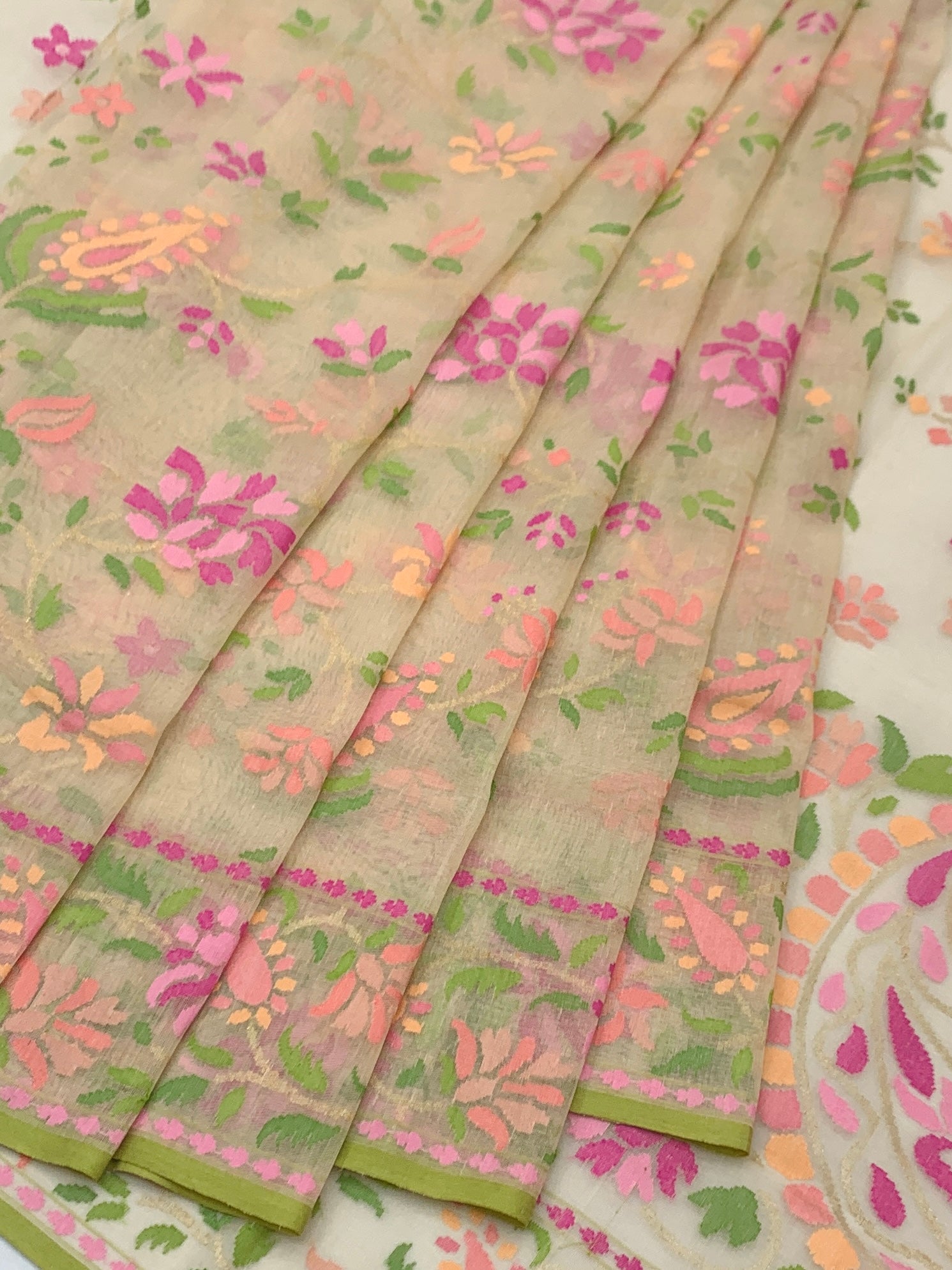 Ethereal Ivory Cotton Jamdani Saree with Vibrant Floral and Paisley Weaves