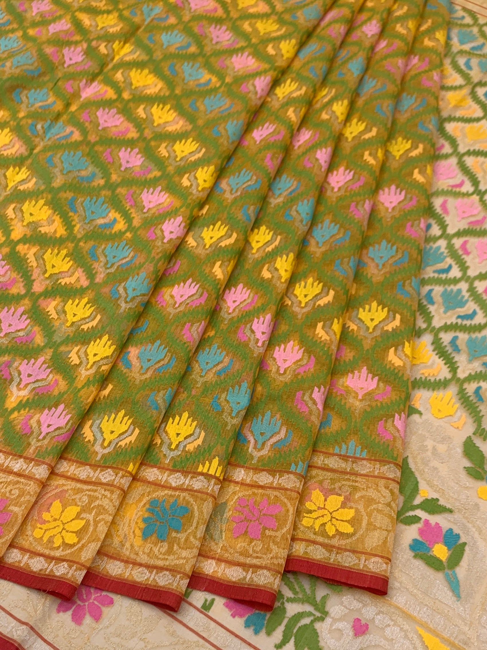 Lush Green and Beige Cotton Jamdani Saree with Geometric Trellis and Floral Weaves