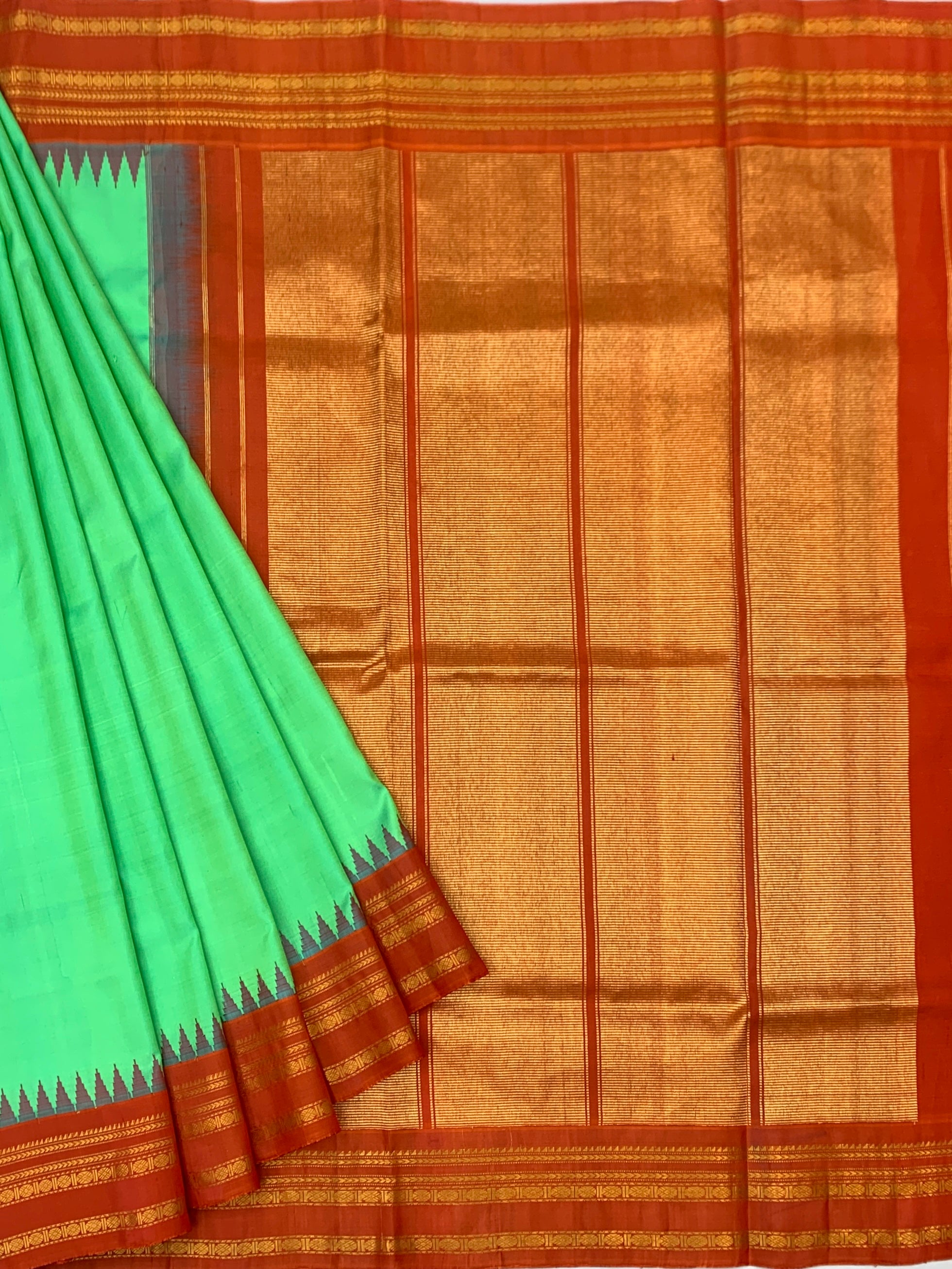 Gadwal Pattu Saree – Emerald Green with Rust Orange & Gold Border