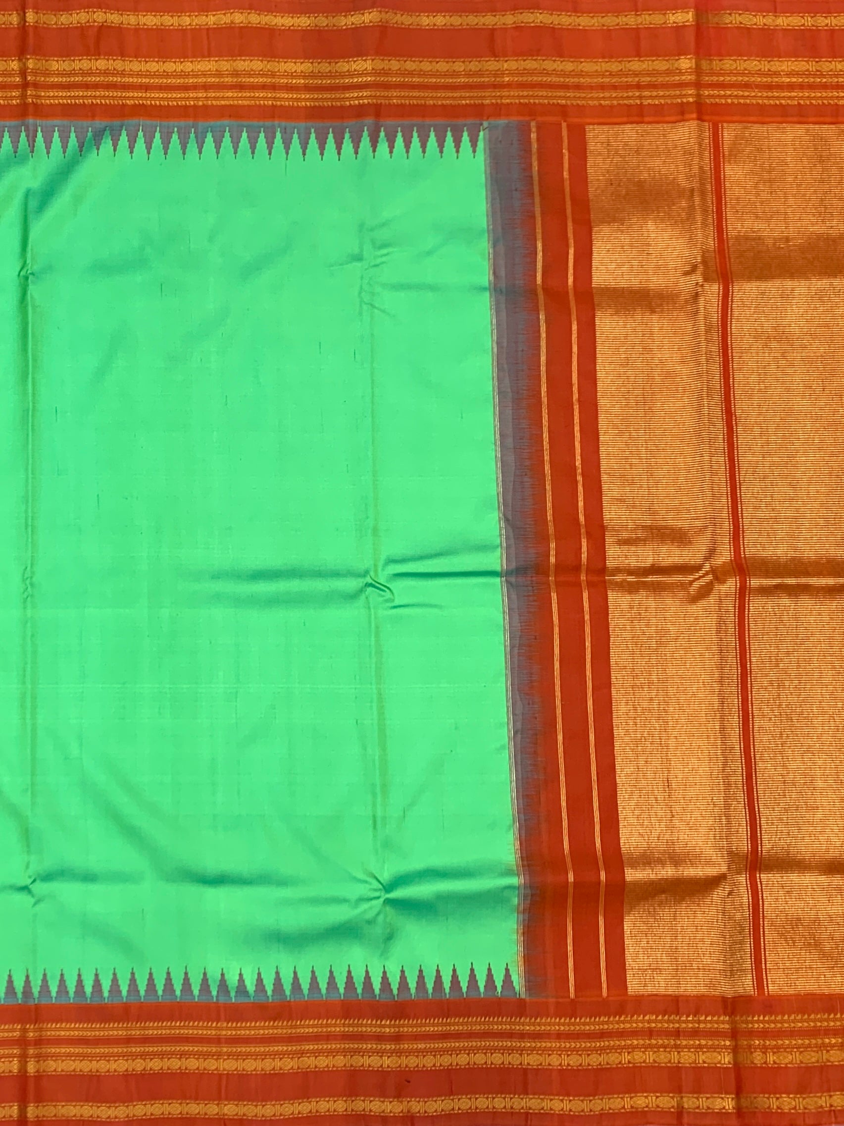 Gadwal Pattu Saree – Emerald Green with Rust Orange & Gold Border