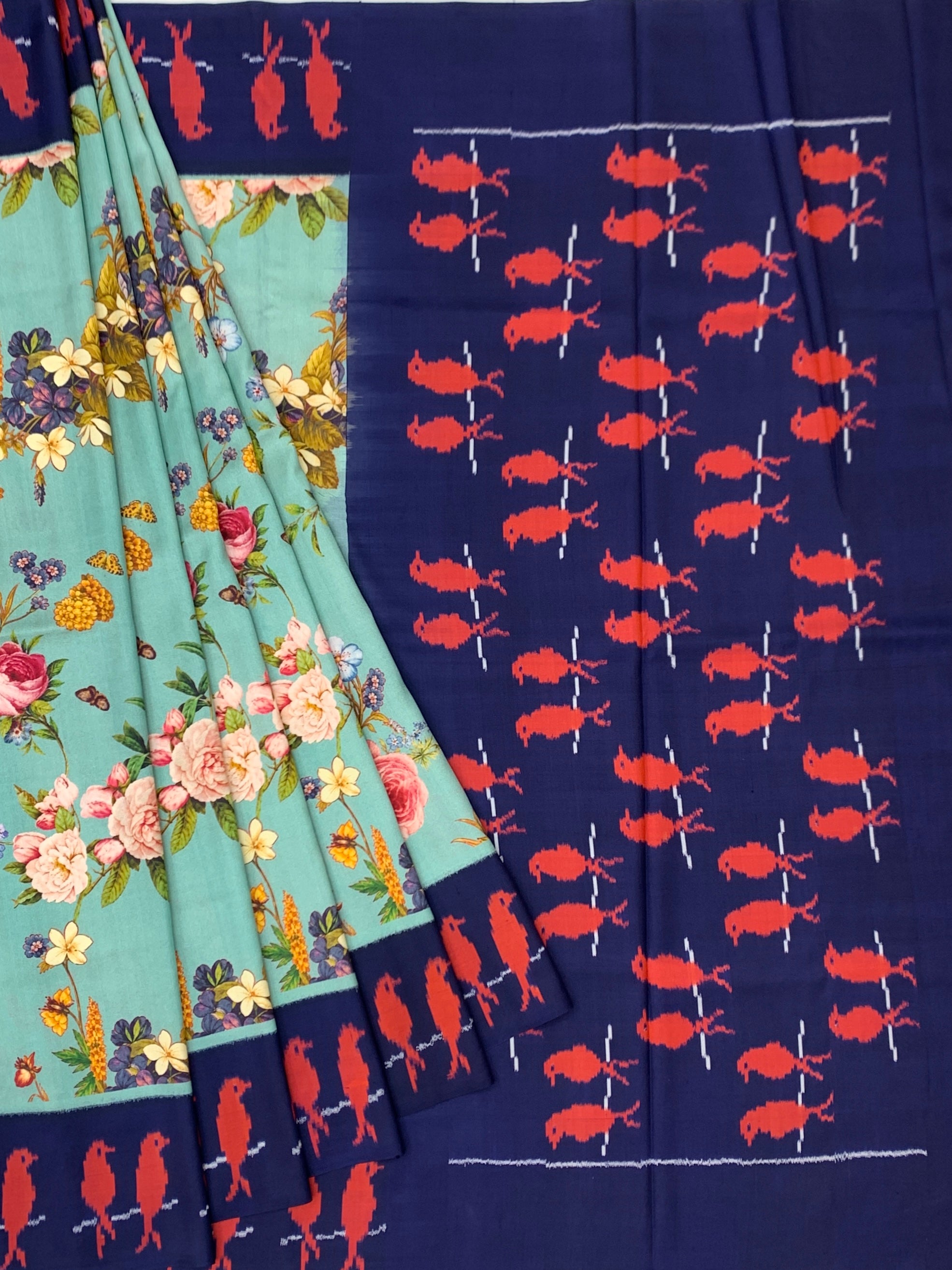 Elegant Sea Green Floral Saree with Navy Patola-Style Border & Blouse