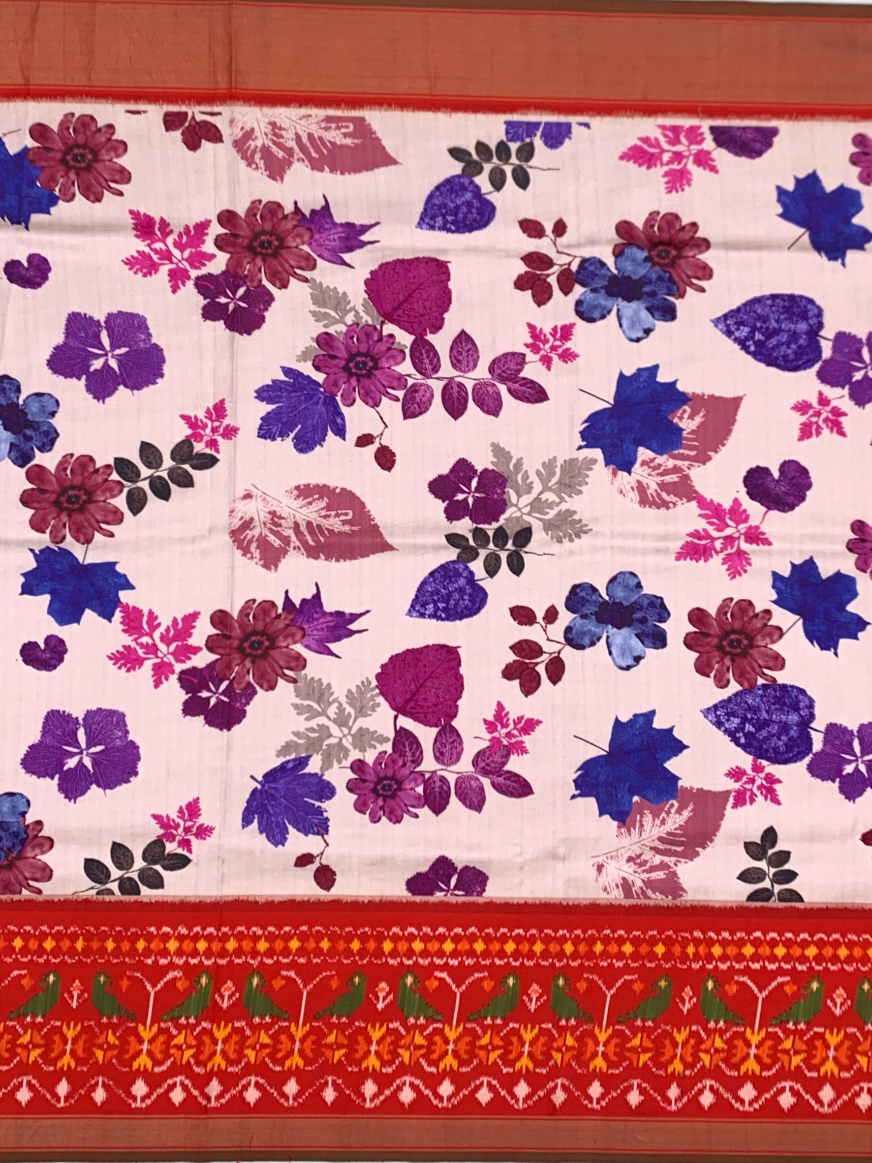 Vibrant Floral Printed Patola-Style Saree with Rich Red Contrast Pallu and Blouse